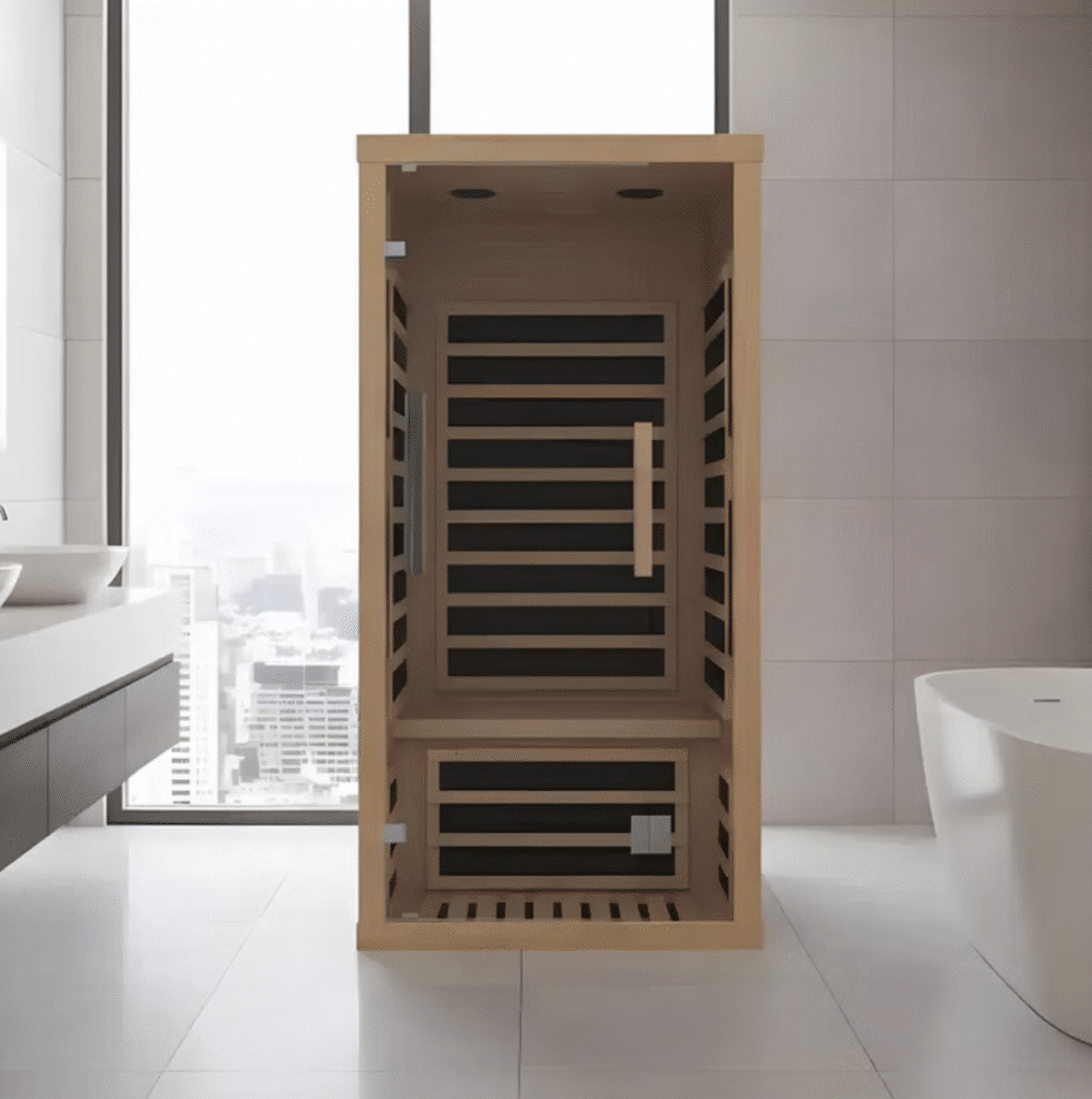 Fiera infrared sauna featuring modern design, full-glass front, and wooden slatted interior, set in a contemporary bathroom with city views.